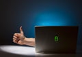 Hand Reaching Out of Computer Giving Thumbs Up Royalty Free Stock Photo