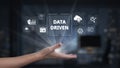 Hand Reaching Out with Data Driven Concept, Digital Icons, Graphs, Technology, Statistical Analysis, Cloud Computing in Royalty Free Stock Photo