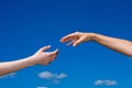 Hand reaching out from the sky Royalty Free Stock Photo