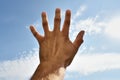 Hand reaching to the sky. Hand reaching towards the sky. Royalty Free Stock Photo