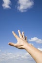 Hand reaching up to the sky Royalty Free Stock Photo