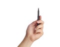 Hand ready for drawing with black marker. Royalty Free Stock Photo