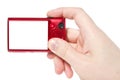 Hand with red digital photo camera Royalty Free Stock Photo