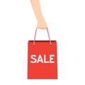 Hand with red shopping bag. Sales and shopping concept. Royalty Free Stock Photo