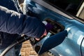 Hand refilling the car with fuel at the refuel station Royalty Free Stock Photo