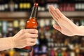 Hand reject a bottle of beer Royalty Free Stock Photo