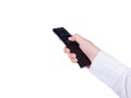 Hand with remote control pointing forward Royalty Free Stock Photo