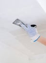 Hand repairs gypsum plasterboard frame Royalty Free Stock Photo