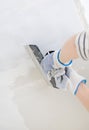 Hand repairs gypsum plasterboard frame Royalty Free Stock Photo