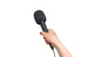Hand of reporter with black microphone isolated on white Royalty Free Stock Photo