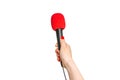 Hand of reporter with red microphone isolated on white Royalty Free Stock Photo