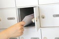 Hand retrieving letters Royalty Free Stock Photo
