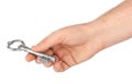 Hand with retro silver key Royalty Free Stock Photo