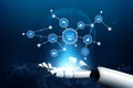 Hand of robot holding light with digital icons representing artificial intelligence, technology, and interconnected data Royalty Free Stock Photo