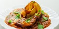 Hand rolled four cheese ravioli pasta in minced beef with Chianti red wine, garlic and herb ragu, and a bechamel sauce topped with Royalty Free Stock Photo