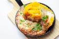 Hand rolled four cheese ravioli pasta in minced beef with Chianti red wine, garlic and herb ragu, and a bechamel sauce topped with Royalty Free Stock Photo