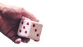 Hand & Rolling Dice. Hand rolls a dices on white isolated background Royalty Free Stock Photo