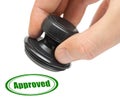 Hand and rubber stamp Approved