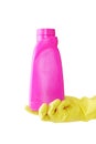 Hand in rubber yellow glove holds pink bottle of liquid bleach on white background. cleaning Royalty Free Stock Photo