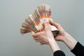 Hand with russian roubles bills on white background Royalty Free Stock Photo