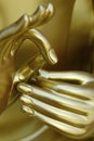 Hand `s detail of statue of buddha, in buddhist temple Royalty Free Stock Photo