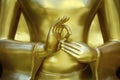 Hand `s detail of statue of buddha, in buddhist temple Royalty Free Stock Photo