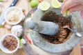 Hand`s person lemon Squeeze in to shrimp paste chilli sauce Royalty Free Stock Photo