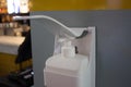 A hand sanitiser dispenser at a restaurant in the Istanbul airport