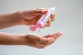 Hand sanitizer bottle gel protect from virus. Female Pouring alcohol gel cleaning virus on sanitizing hands, close up