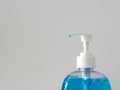 Hand Sanitizer, gel alcoholic mixture with gelatin in clear Plastic bottle with pump pushing, washing clean dirty to prevent germs