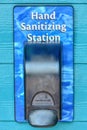 Hand sanitizing station in a public setting