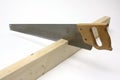 Hand saw cutting wood Royalty Free Stock Photo