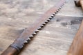 Hand saw old and rusty close up traditional tool Royalty Free Stock Photo