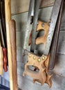 Hand Saws Hanging in a Toolshed