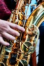 Hand and saxophone details in a band, music show Royalty Free Stock Photo