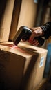 Hand Scanning Package with Barcode Reader in Warehouse Setting Royalty Free Stock Photo
