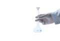 Hand scientist wearing rubber gloves and hold 100 ml. Erlenmeyer flasks isolated on white Royalty Free Stock Photo