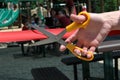 Hand and scissors cutting a ribbon during an opening ceremony Royalty Free Stock Photo