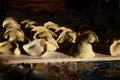 Hand-sculpted dumplings on a wooden board