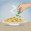 Hand seasoning a spaghetti dish