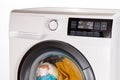 The hand select settings for laundry on modern digital display. Close-up view of automatic washing machine with touch screen on Royalty Free Stock Photo