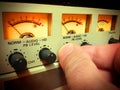 Hand setting audio level Royalty Free Stock Photo