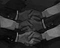 Hand shake business concept of partnership deal agreement together lot of hand as a team multilateral trade Royalty Free Stock Photo