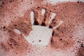 Hand shape on sand like aboriginal art style Royalty Free Stock Photo