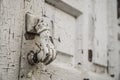 Hand shaped knob of a wooden door Royalty Free Stock Photo