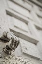 Hand shaped knob of a wooden door Royalty Free Stock Photo