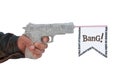 Hand with shoting newspaper pistol and flag Royalty Free Stock Photo