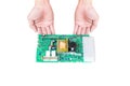 Hand showing electronic circuit board isolated in white background. Royalty Free Stock Photo