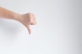 Hand showing thumb down gesturing dislike, unlike or disagree Royalty Free Stock Photo