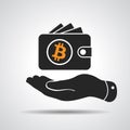 hand showing wallet with symbol of bitcoin
